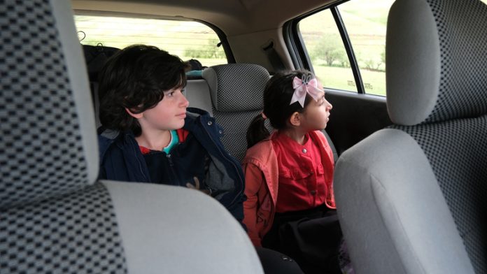 Niños en carro